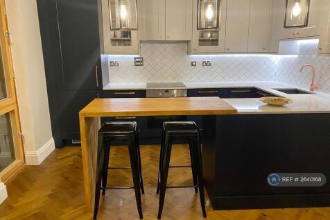 Open Plan Kitchen Dining With Bar Stools
