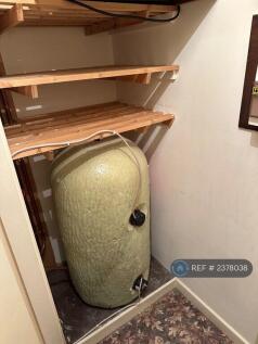 Water Tank With Shelves Above