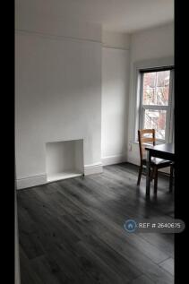 Lounge (With Dining Table From The Kitchen)