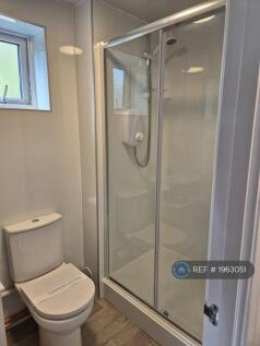 Showering Area Enclosed