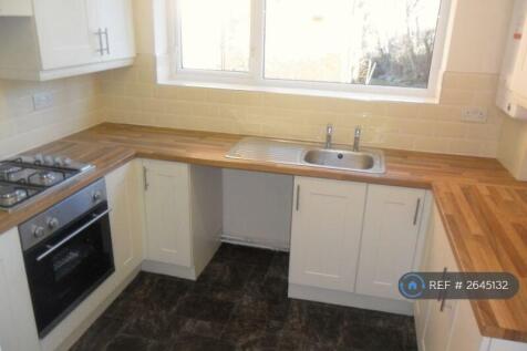 Kitchen With Bulit In Cooker And Hob.