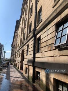 Quiet Cobbled Street With River Views