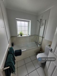 Bathroom With Over Bath Shower