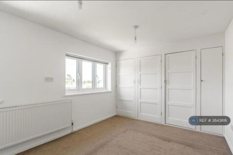Bedroom With Enclosed Cupboards