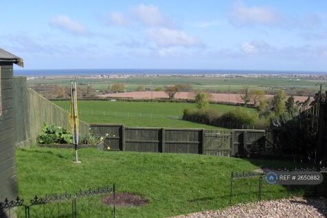 Rear Garden And Coastal Views