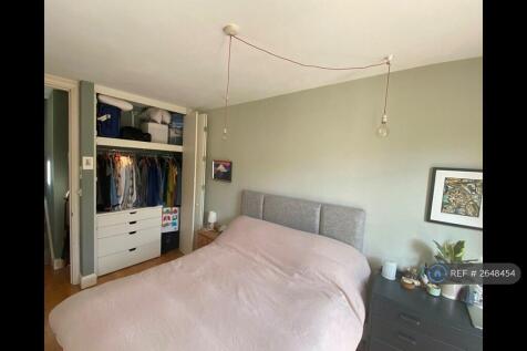 Big Built-In Wardrobe And Storage Bed