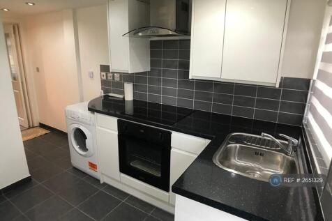 Kitchen With a Door To Bedroom / Living Area 