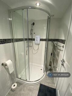 Electric Shower With Glass Cubical