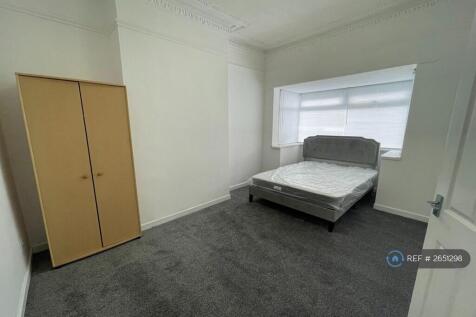 Spacious Bedroom With a King-Size Bed