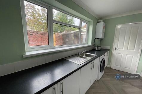 Modern Bright Kitchen With a Large Window