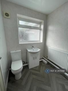 Modern Bathroom With Brand-New Sink And Toilet