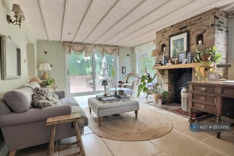 The Reception Room With a Fireplace