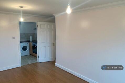 Living Room With Door To Kitchen