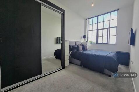 Spacious Main Bedroom With Storage