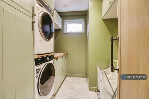 Utility Room With In Built Washer And Drier
