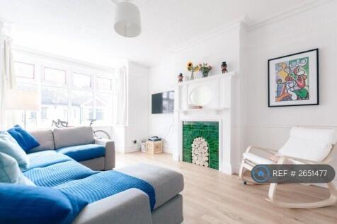 Large Reception Room Featuring High Ceilings. 