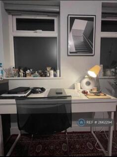 Desk And Chair Provided In The Room