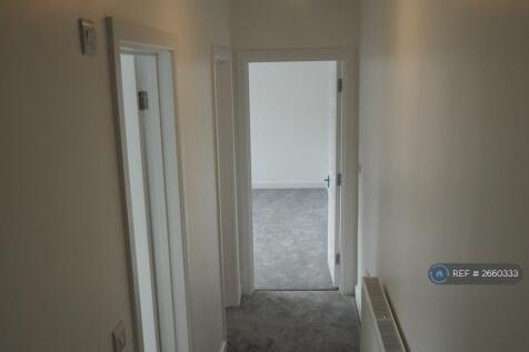Hallway To The Utility Room And Bedroom 