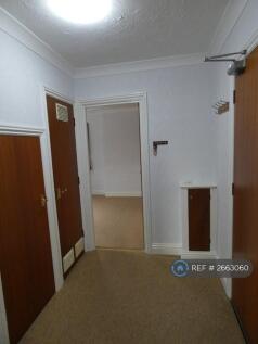 Entrance Hall With Fitted Cupboards