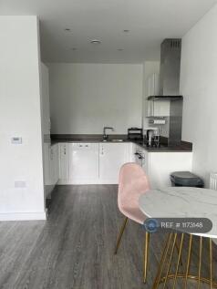 Kitchen Area Including Dishwasher