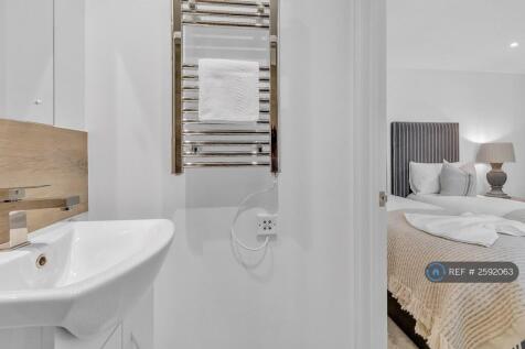 Bathroom With Shower And Toilet, Basin And Mirror