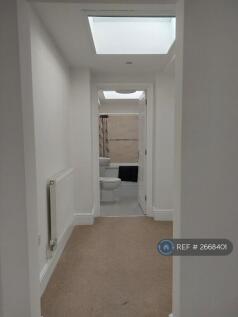 Hall Leading To Study And Bathroom