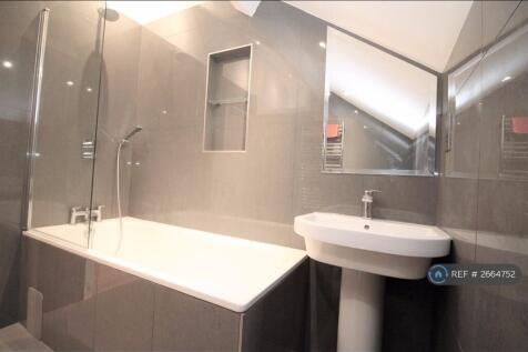 Main Bathroom With Bath And Shower Over