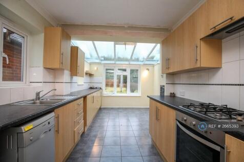 Kitchen Leading Into Conservatory Dining Area 