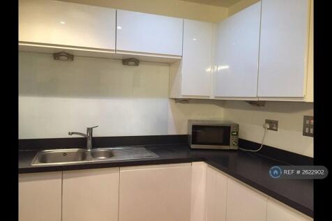 Dishwasher And Storage Area In The Kitchen