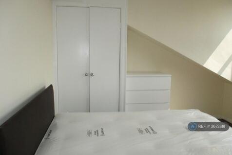 Top Floor Room With Full Length Window      