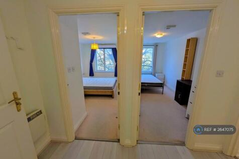 Corridor To Two Rooms