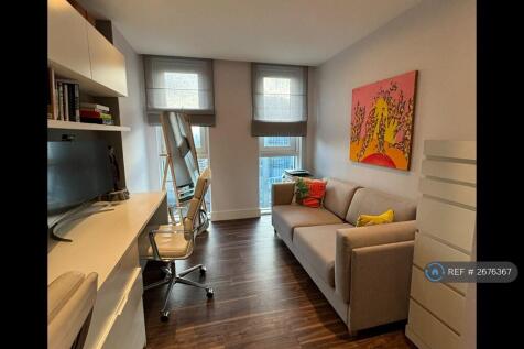 Office Space For Two And a Retractable Sofa