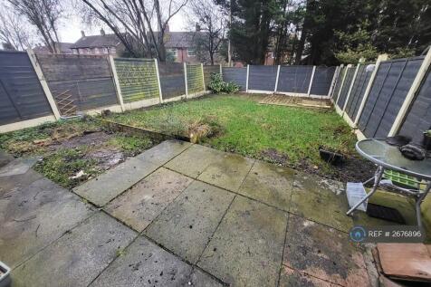 Rear Garden Patio And Flower Beds