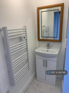 Bathroom Sink And Heated Towel Rail
