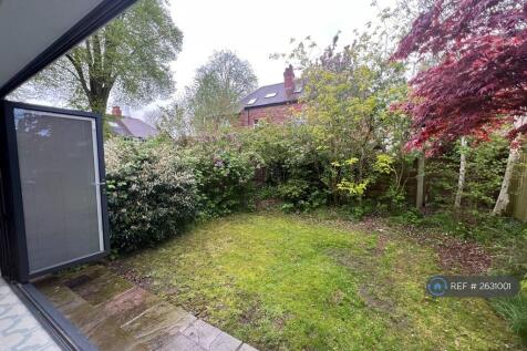 Rear Lawned Garden With Patio Area