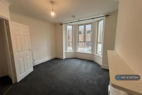 Bedroom With Large Bay Window