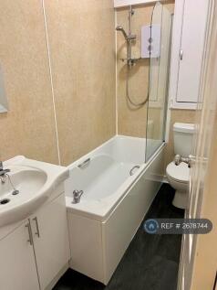 Bathroom With Shower And Ample Storage