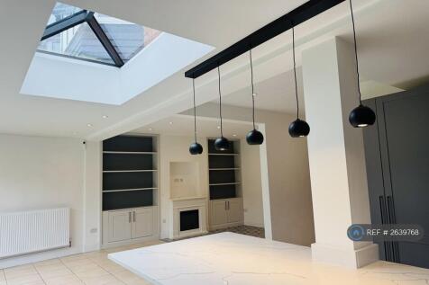 Light Streams Into The Kitchen From The Skylight.