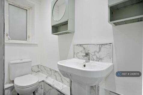 Rooms 1 &amp; 2 Bathroom (Downstairs)