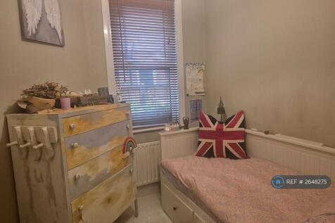 Bright Second Bedroom With Storage