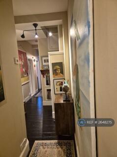 Welcoming Hallway With Character Décor