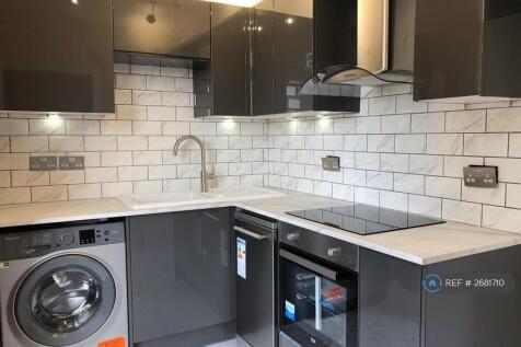 New Kitchen With Back Door To Enclosed Garden
