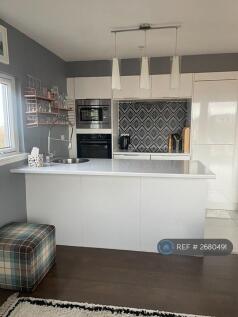 Kitchen With Breakfast Bar