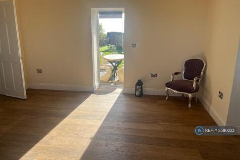 Living Area With Door To Back Garden