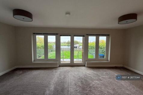 Lounge With Doors To Balcony