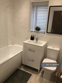 Family Bathroom With Bathtub And Shower Over 