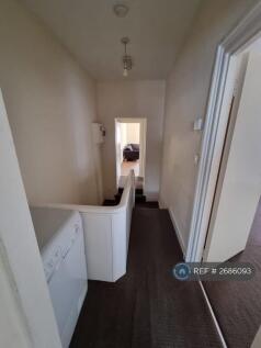 Hallway Looking Towards Kitchen And Bathroom