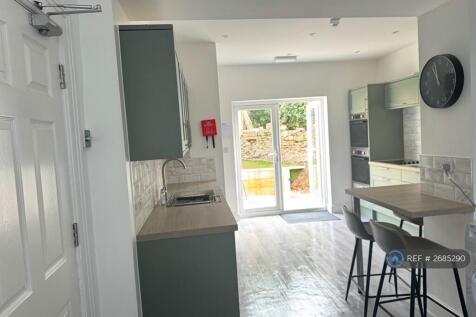 Kitchen With Doors To Garden