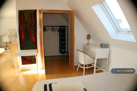 Bedroom With Walk-In Cupboard