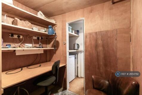 Workstation In Garden Studio With Kitchenette